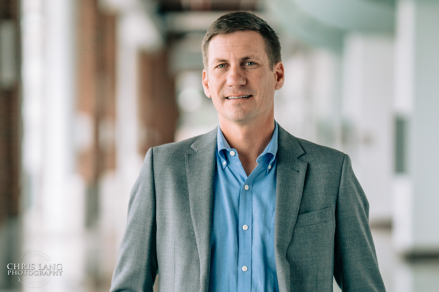 Wilmington NC Headsot Photographers - Headshot Photography - Image of male business professional in a suit - Chris Lang Photography