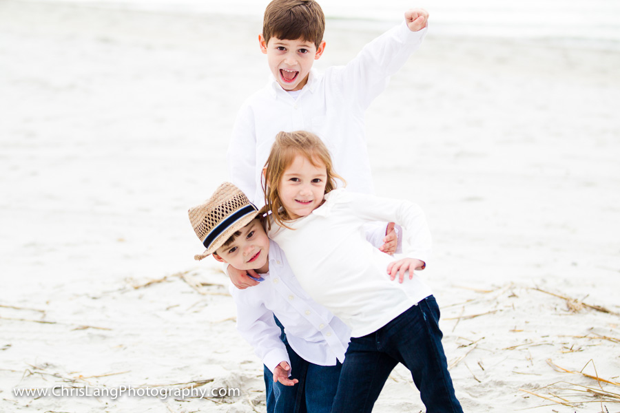Wilmington Family Portriat Photographer picture of kids on the beach posing for the photographer