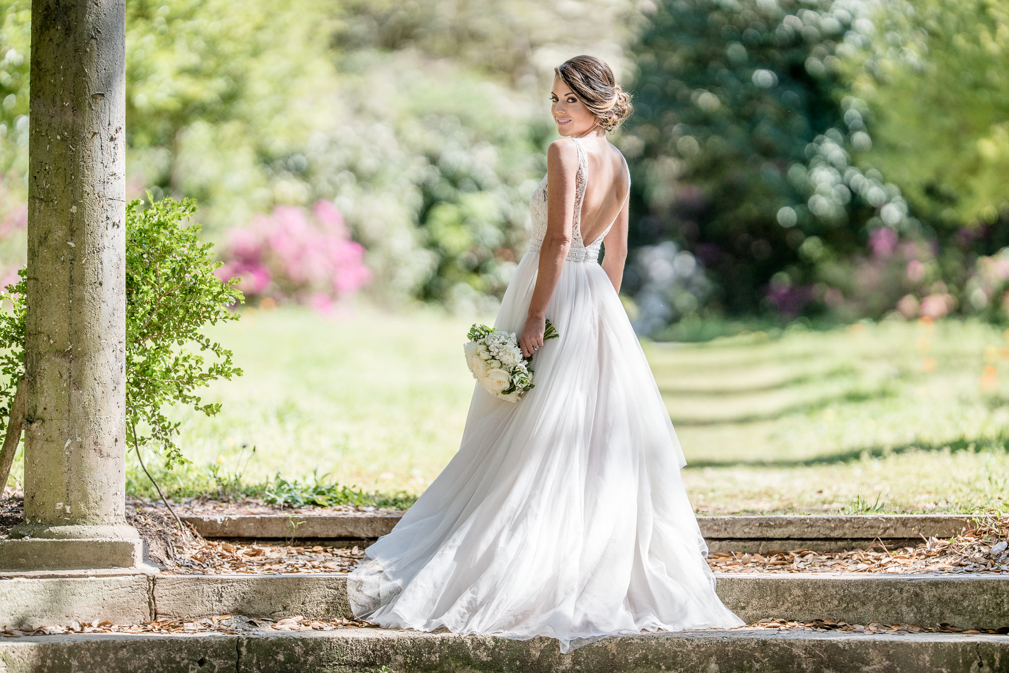 Garden pergola - wedding flowers - stunning bride -Airlie Gardens - Bride in wedding dress - wedding floweers - Bridal portrait - bridal portrait photography - Wilmington NC Wedding & Bridal Portrait Photographers  - Chris Lang Photography  