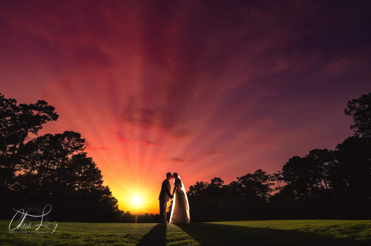 Sunset photo of Bride & Groom - Lifestyle wedding Photo - Wilmington NC Wedding Photographer - Wedding Photography - Wedding Photo - Chris Lang Photography